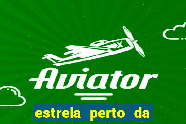 estrela perto da lua hoje