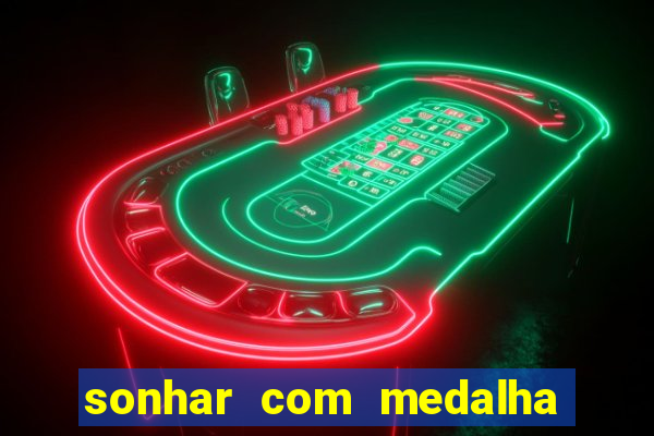 sonhar com medalha de santo